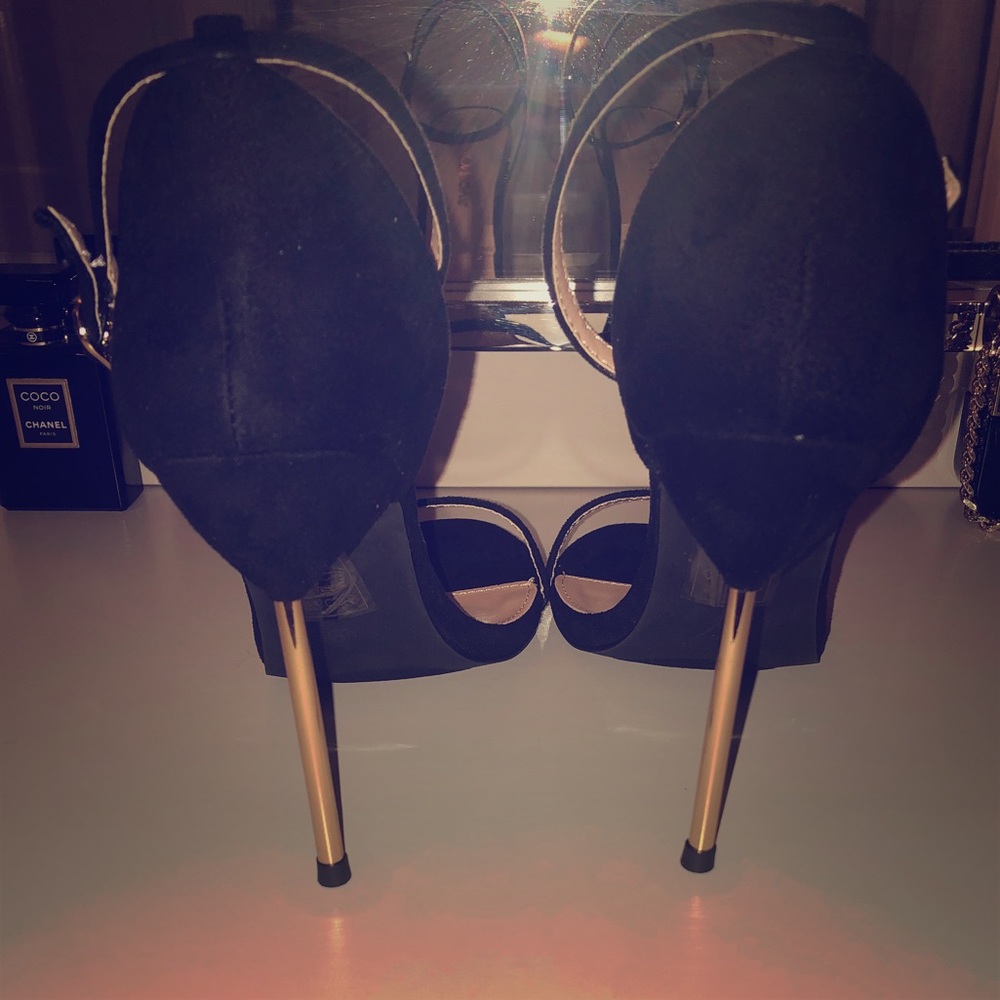 Sexy black metal stiletto heels.
